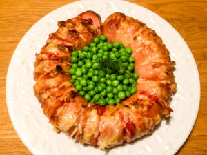 The cooked Falukorv with English peas. The cooked Falukorv with English peas.