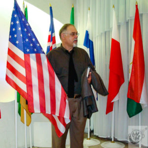 Ron and the USA flag at a global conference in Krasnoyarsk, Siberia – RU. Ron and the USA flag at a global conference in Krasnoyarsk, Siberia – RU.