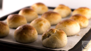 A tray of freshly baked Semla buns. A tray of freshly baked Semla buns.