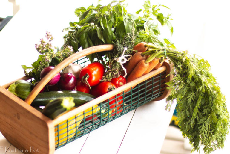 A basket full of fresh veggies and herbs from the herb'n' garden. A basket full of fresh veggies and herbs from the herb'n' garden.