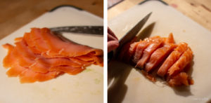Smoked salmon being sliced. Smoked salmon being sliced.