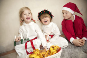 Cecilia Larsson Lantz/Imagebank.sweden.se Young Swedish children enjoying St. Lucia festivities.