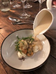 Mussel soup over smoked fresh cheese and sauteed fennel Mussel soup over smoked fresh cheese and sauteed fennel