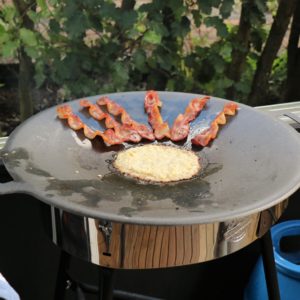Raggmunk and cured pork belly frying on the Muurikka. Raggmunk and cured pork belly frying on the Muurikka.