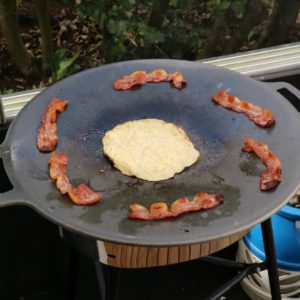 Raggmunk and cured pork belly frying on the Muurikka. Raggmunk and cured pork belly frying on the Muurikka.