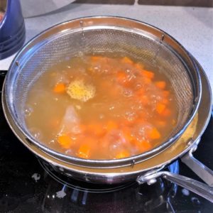 Poaching the veggies in fish stock. Poaching the veggies in fish stock.