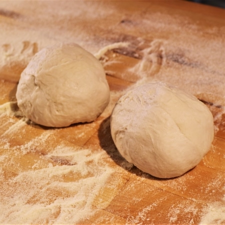 Pizza dough after being rolled into balls. Pizza dough after being rolled into balls.